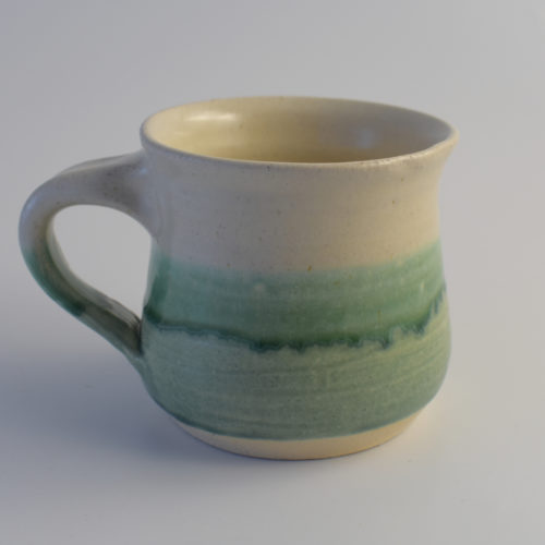 green and white stoneware pottery mug